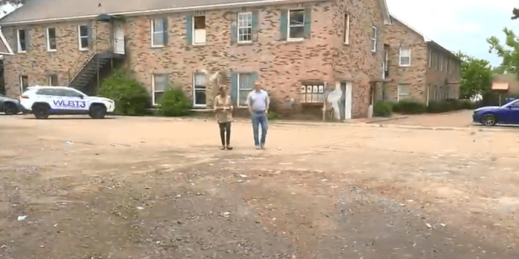 Eyesore to businesses results in owner cleaning debris from vacant building